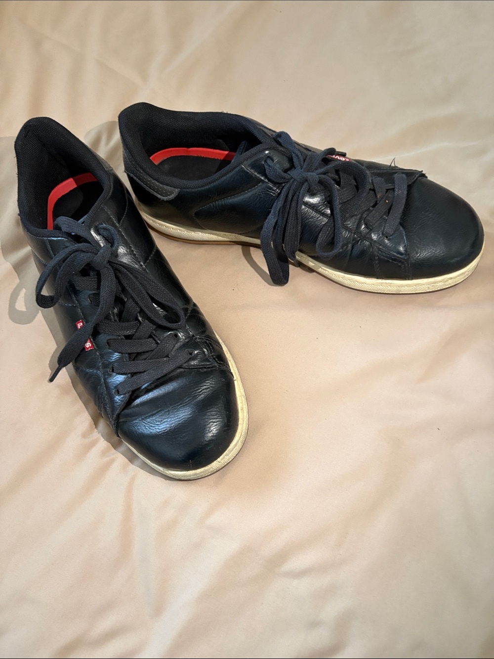 Levi's Black Leather Low-Top Sneakers with Red Inner Trim